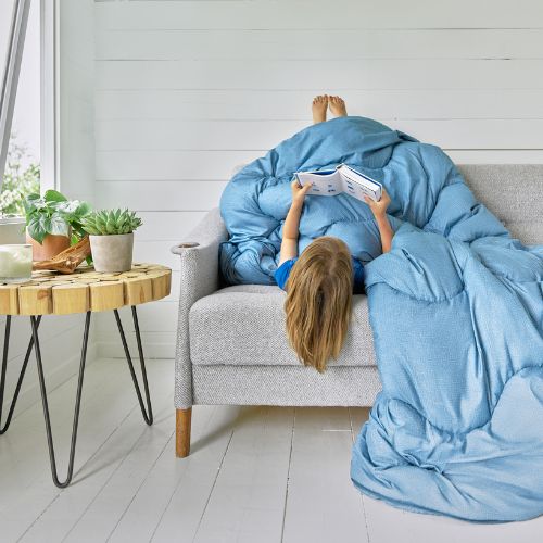 Night Lark/ Night Owl Coverless Duvet In Twilight BLue With Child on The sofa